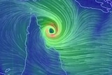 A satellite wind map shows Severe Tropical Cyclone Trevor off the Far North Queensland coast.