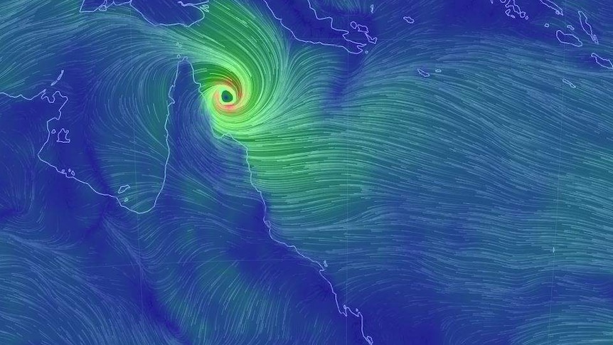 A satellite wind map shows Severe Tropical Cyclone Trevor off the Far North Queensland coast.