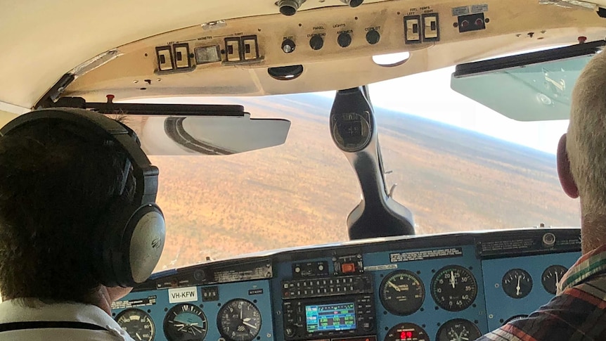 The dashboard of a small plane flying a pilot and passenger