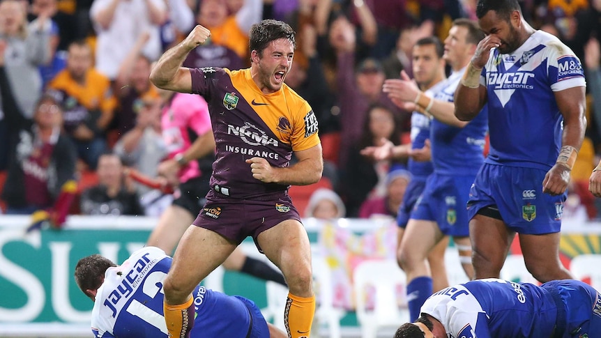 Ben Hunt celebrates a Broncos try