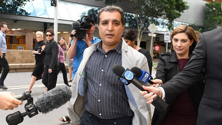 Clive Palmer's doctor, Reza Madah, arrives to court.