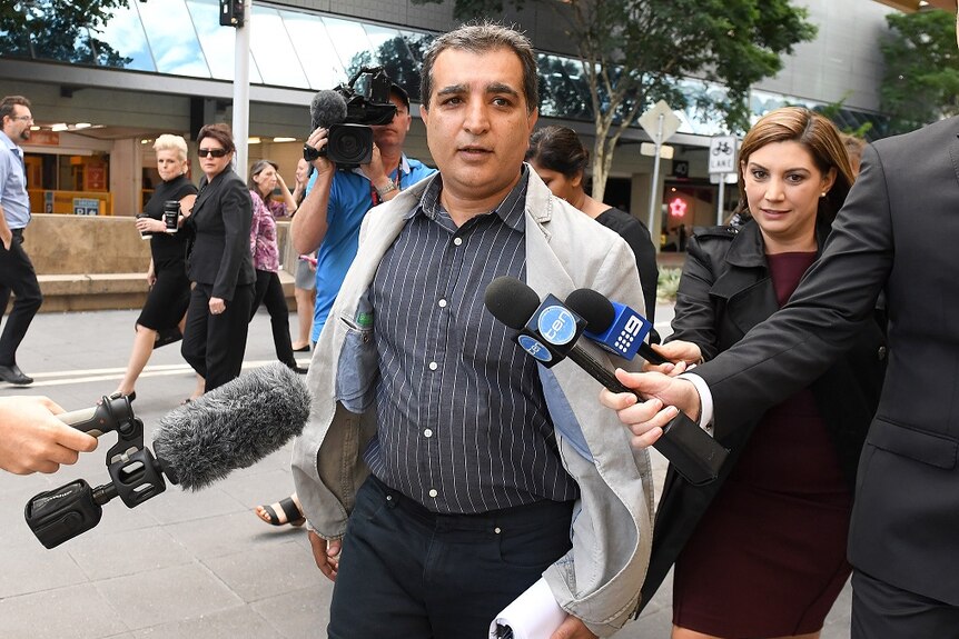 Clive Palmer's doctor, Reza Madah, arrives to court.