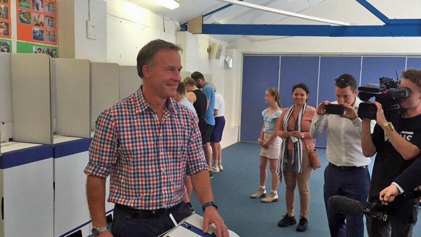 Liberal Leader Will Hodgman casts his vote