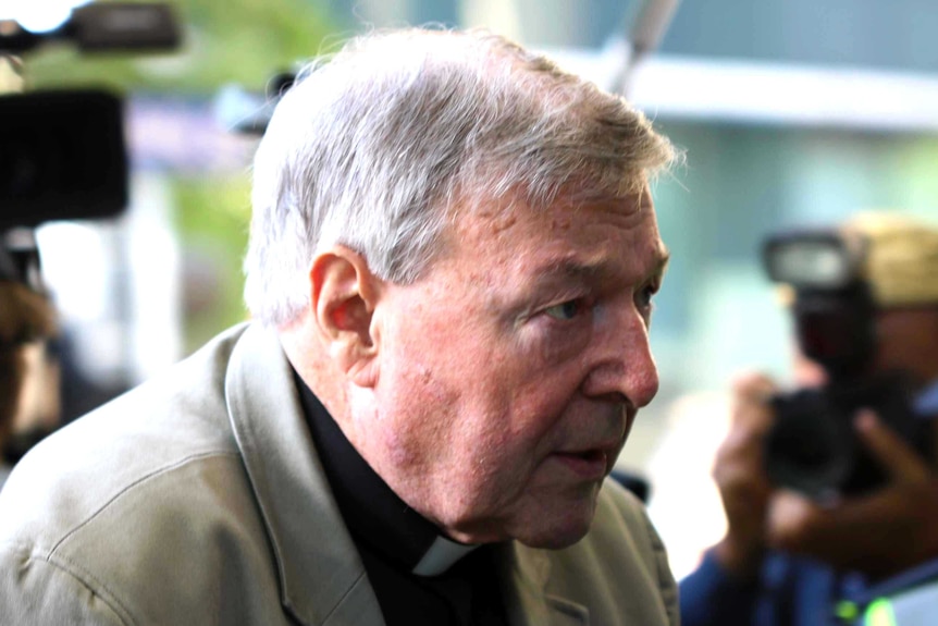 George Pell arrives at the Melbourne Magistrates' Court for the first day of a committal hearing