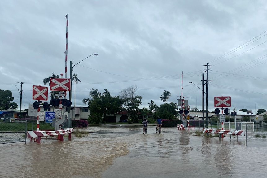 Flooded level rail crossing in Giru, south of Townsville