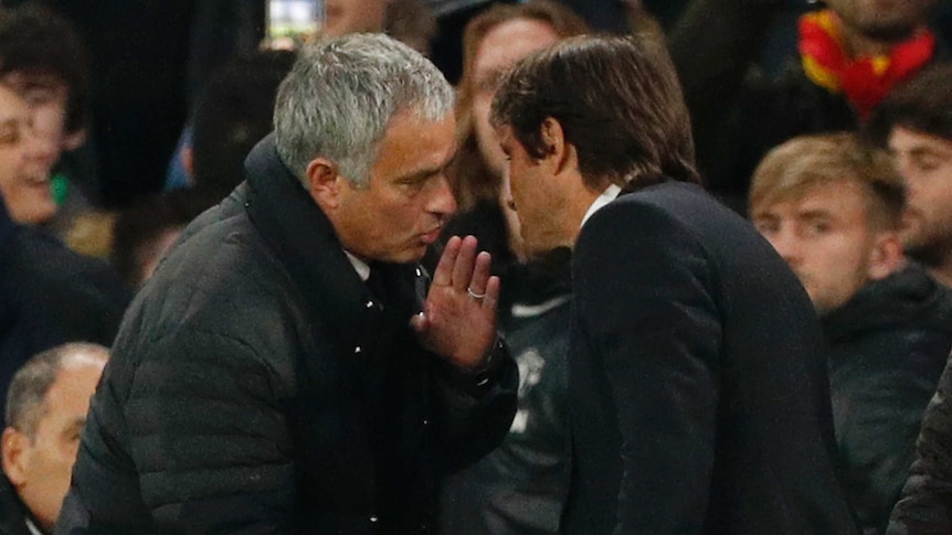 Jose Mourinho whispers in Antonio Conte's ear