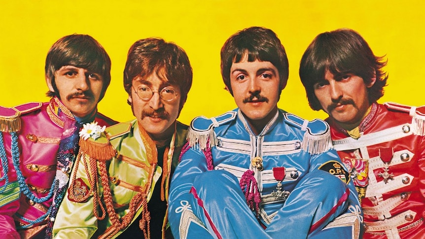 Sgt Pepper gatefold sleeve showing the four Beatles in front of a yellow background