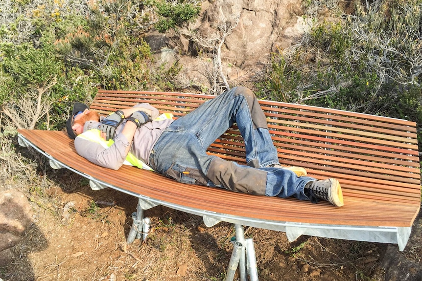 Simon Ancher lying on a bench