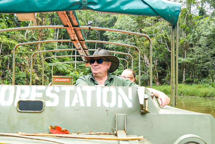 man driving amphibious vehicle