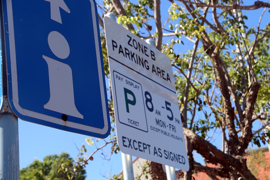 Signs indicate paid on-street parking Palmerston that has been introduced.