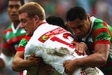 Ben Creagh of the Dragons runs through the Rabbitohs defence