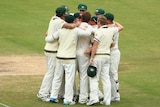 Australia celebrate after they defeated England during day five of Second Ashes Test Match between Australia and England at Adelaide Oval on December 9, 2013.