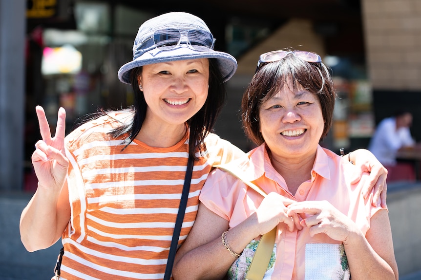 A close-up photo of Jennifer Fong and Felicia Siew smiling.