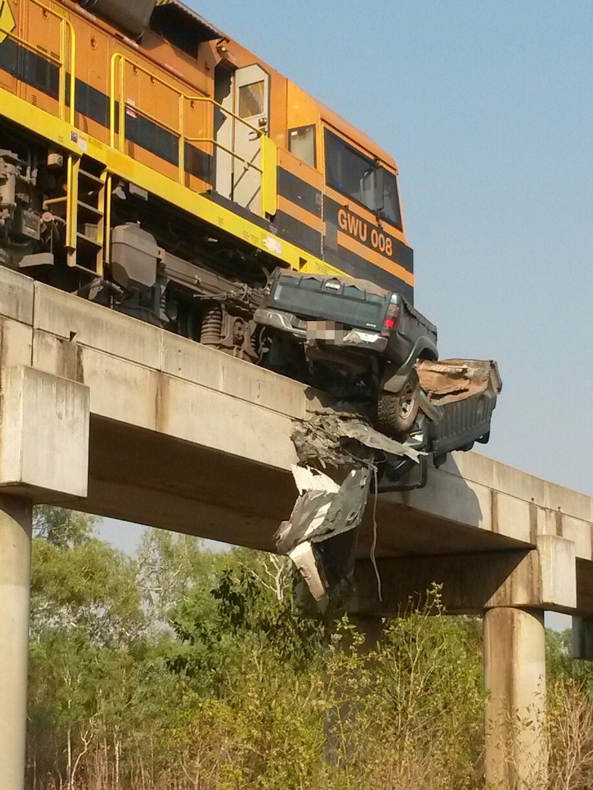 The lead locomotive dragged the 4WD vehicle about 500 metres down the Adelaide-Darwin rail line.