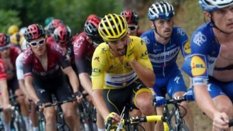 Egan Bernal takes Tour de France yellow jersey after extreme weather ...