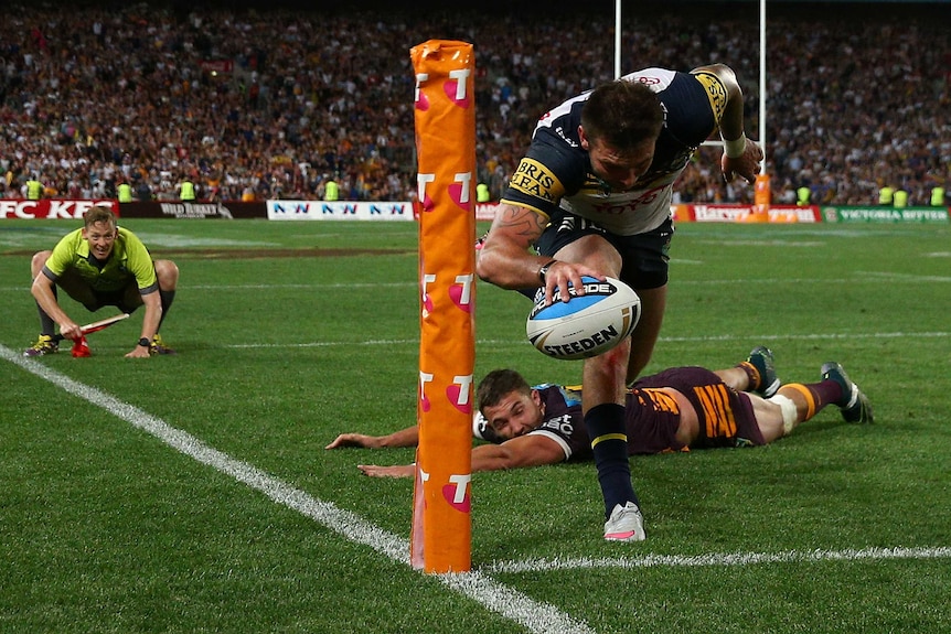 Feldt scores the crucial try for the Cowboys