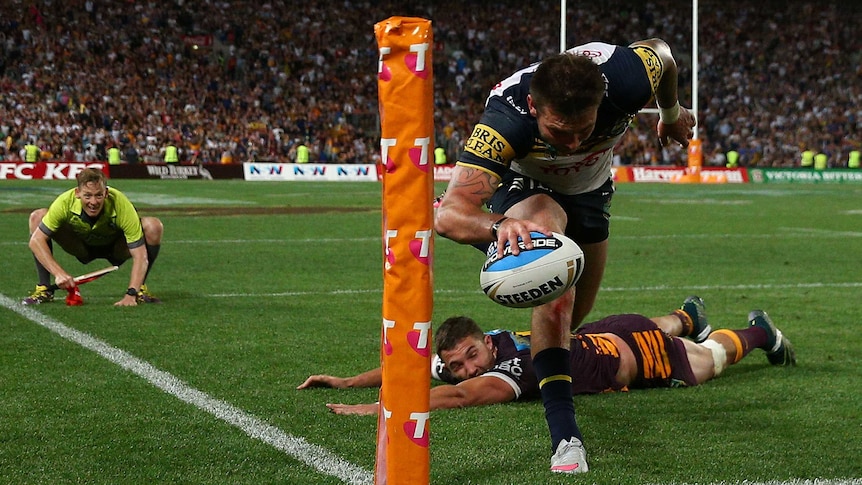 Feldt scores the crucial try for the Cowboys