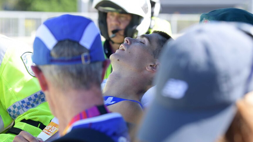 Callum Hawkins of Scotland after collapsing while in the lead of the men's marathon.