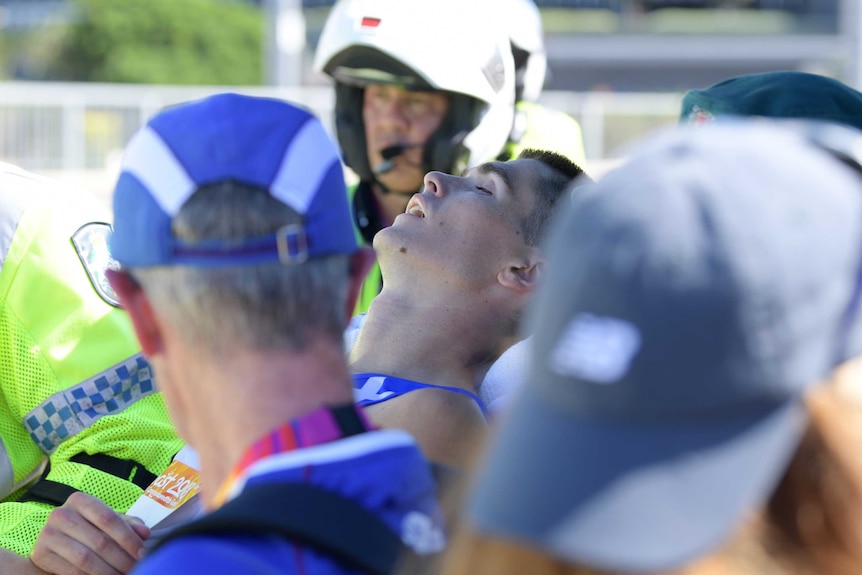 Callum Hawkins of Scotland after collapsing while in the lead of the Men's Marathon Final.