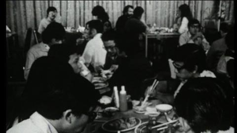 People dine in Chinese restaurant