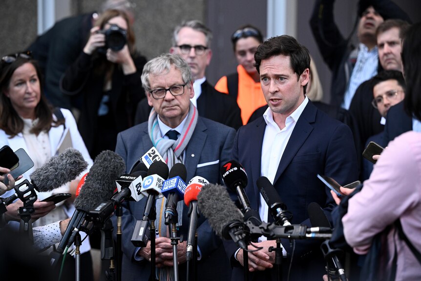 Journalists Chris Masters and Nick McKenzie give a statement outside the Federal Court, in Sydney, Thursday, June 1, 2023