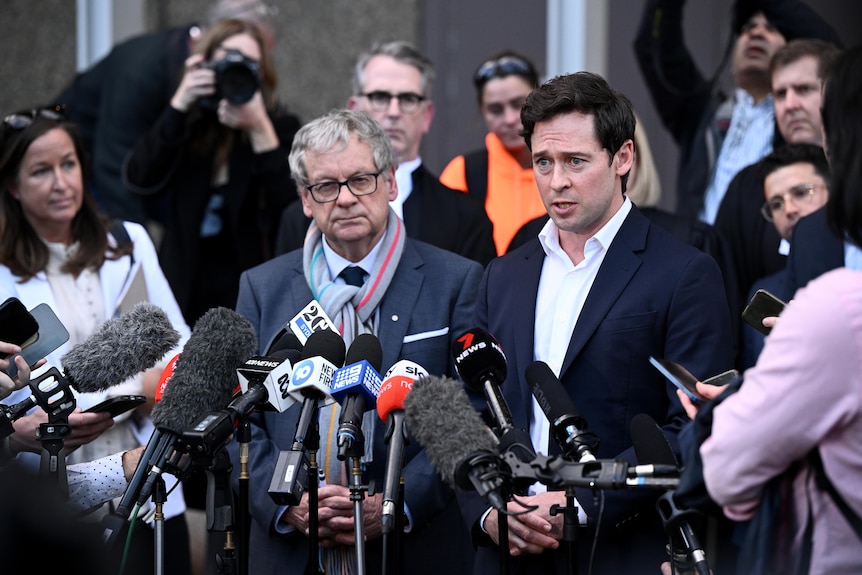 Journalists Chris Masters and Nick McKenzie give a statement outside the Federal Court, in Sydney, Thursday, June 1, 2023