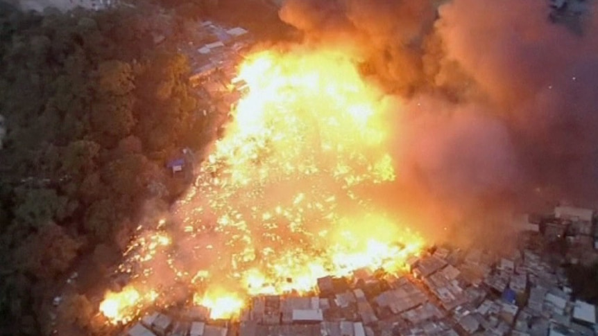 A fire burns at the Estrada de Alpina slum in Sao Paulo.