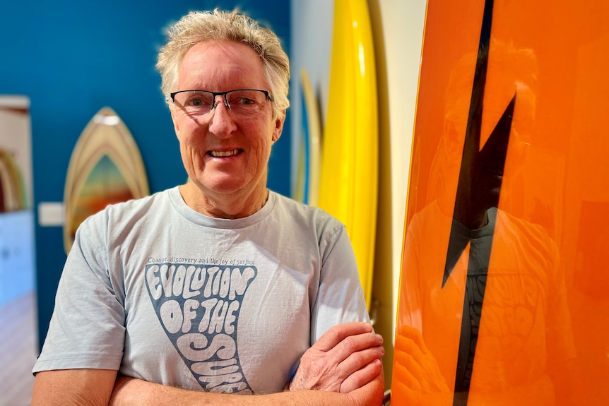 Man with surfboards