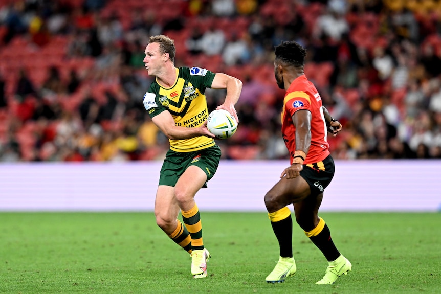 Daly Cherry-Evans looks to pass during a PM's XIII rugby league game against PNG.