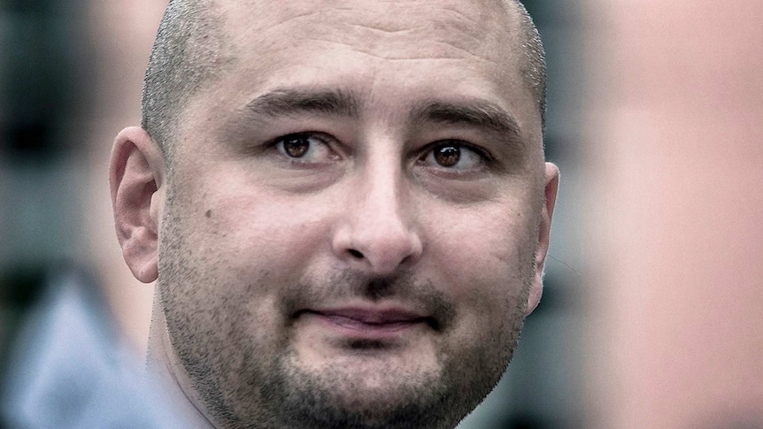 A close up of the face of Arkady Babchenko.