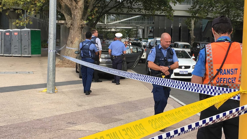 Police cordon off an area outside the Esplanade bus port in Perth's CBD.