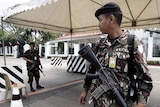 A Philippines Army soldier keeps watch outside the presidential palace in Manila.