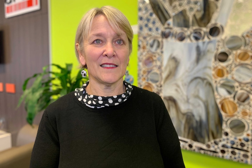 The Council on the Ageing's Jane Mussared standing up wearing a black jumper