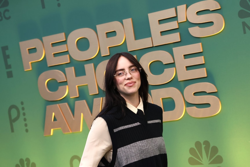Billie Eilish poses on arrival at the People's Choice Awards