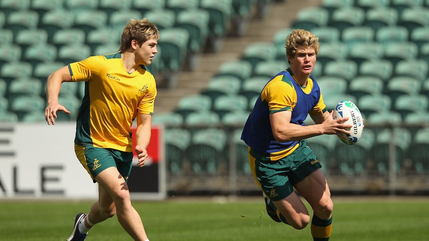 Filer of Berrick Barnes and James O'Connor at training