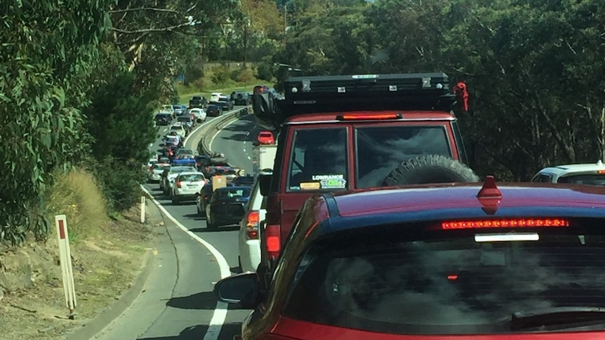 A line of cars bumper to bumper