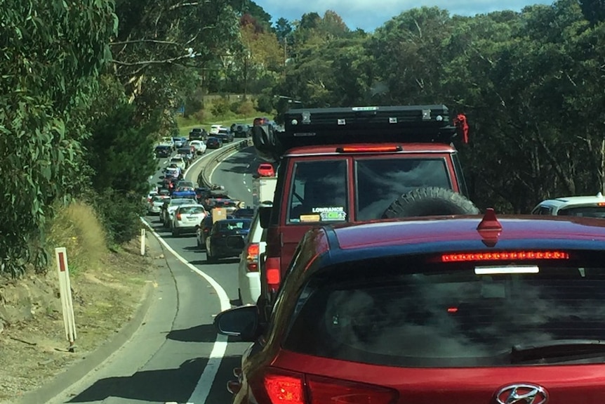 A line of cars bumper to bumper