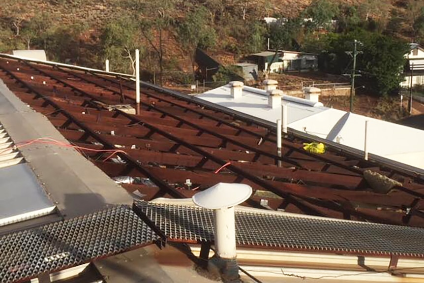 Roof trusses exposed by wind damage to the roof of Mt Isa Hospital
