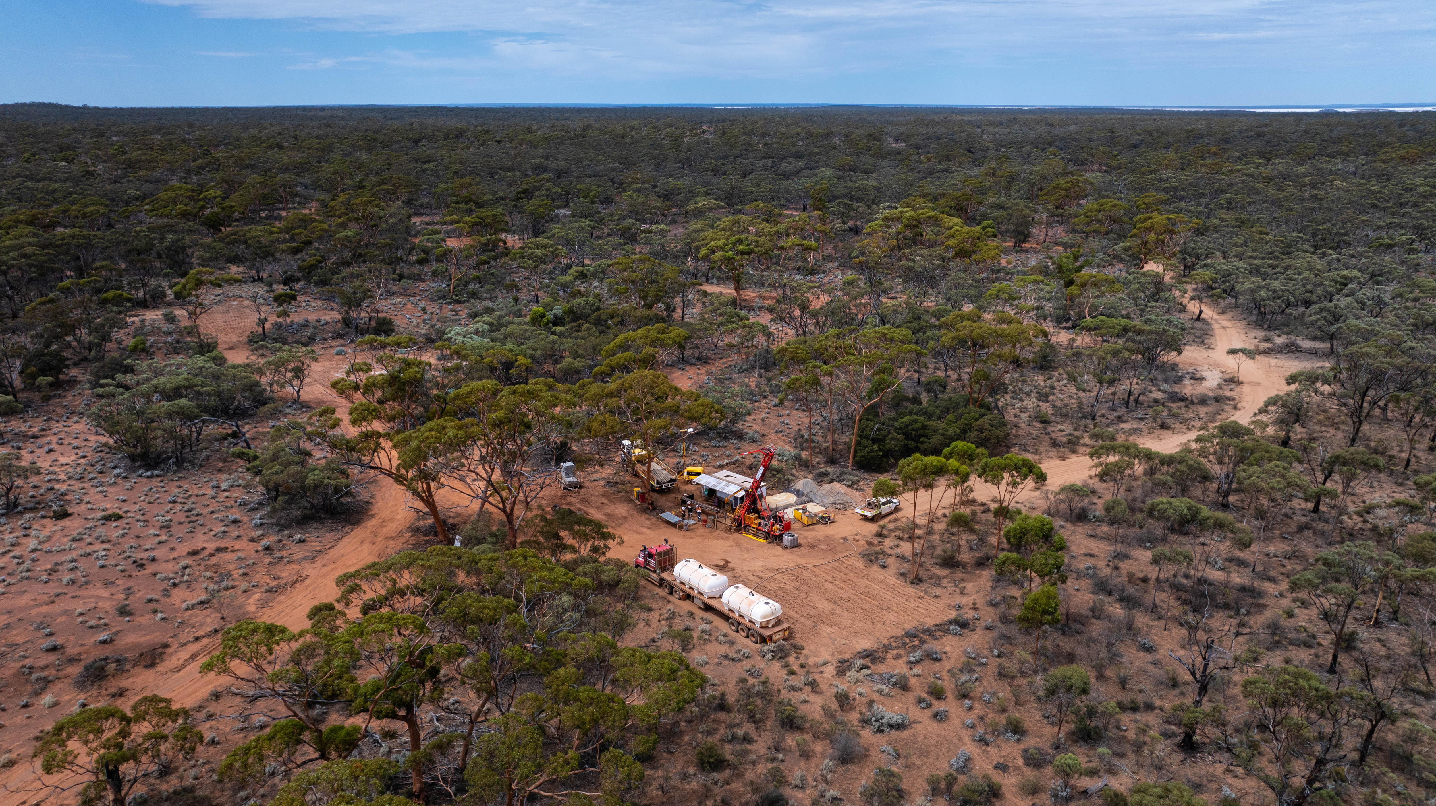 An aerial view of a drill rig working in bush landscape. 