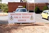 sign in parking lot that says 'Northern Territory Fire & Rescue Service