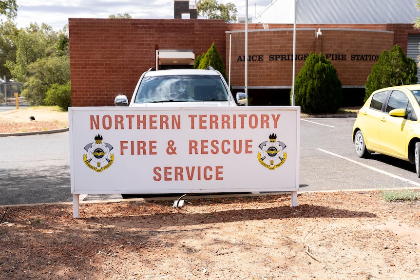 sign in parking lot that says 'Northern Territory Fire & Rescue Service