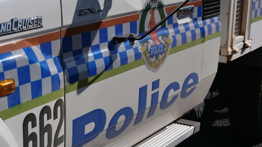A close up of a car with NT Police branding.