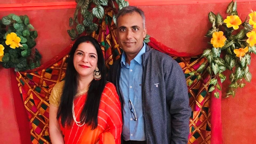 Monica and Vikas sharma at an event, in a story about coping with long-distance marriages during the pandemic.