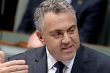 Treasurer Joe Hockey delivers his first budget to the House of Representatives.