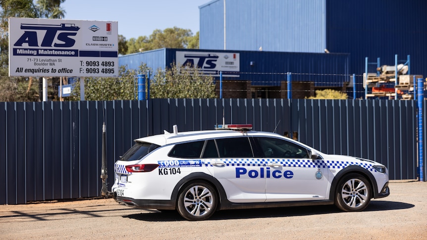 Police vehicle parked outside of ATS Mining Maintenance after a death at the business in South Boulder, Western Australia.