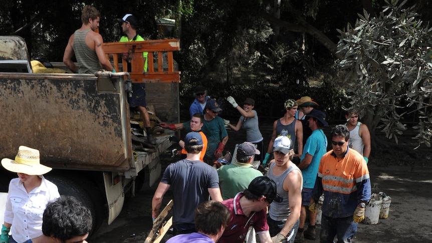 Volunteers help with the flood clean-up