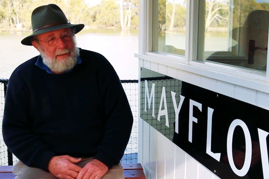 Robert O'Callaghan sitting on the Paddle Boat Mayflower.