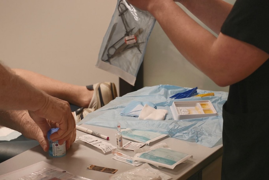 Medical kits being prepared.