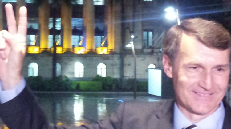 LNP's Brisbane mayor Graham Quirk claims victory outside city hall in council election on April 28, 2012