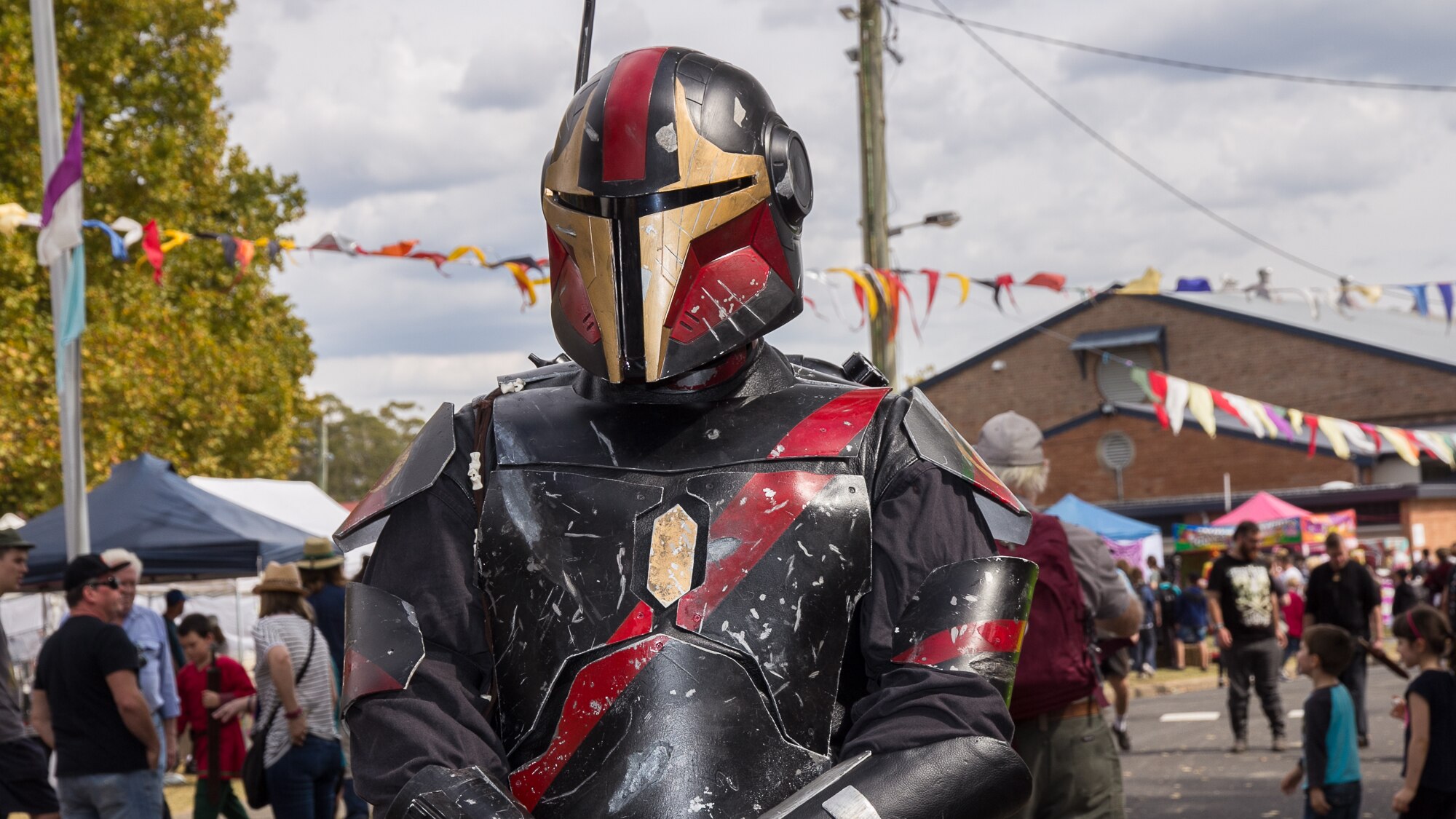 A man in star wars themed costume like Boba Fett